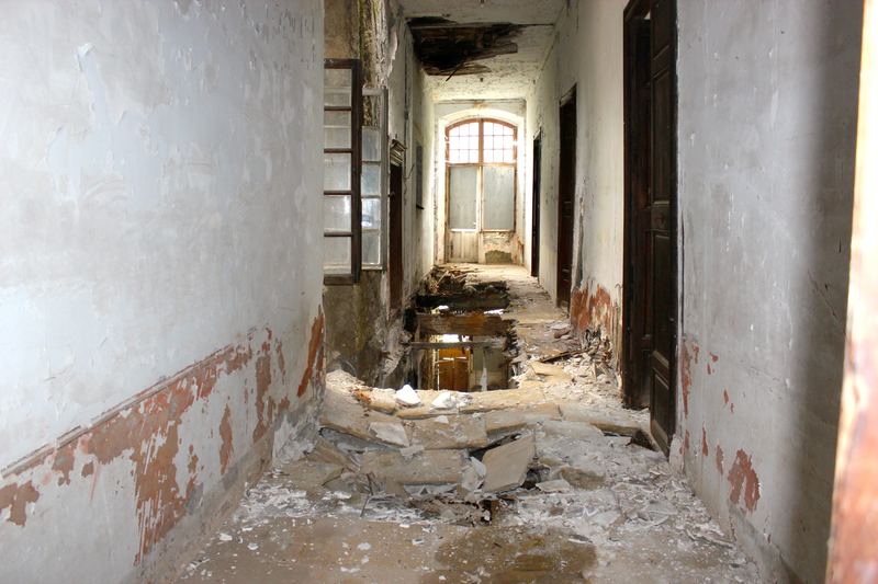 A long corridor, the floor giving way