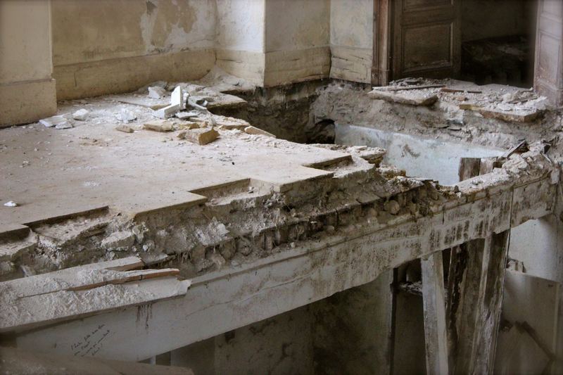 A floor fallen through to the room below