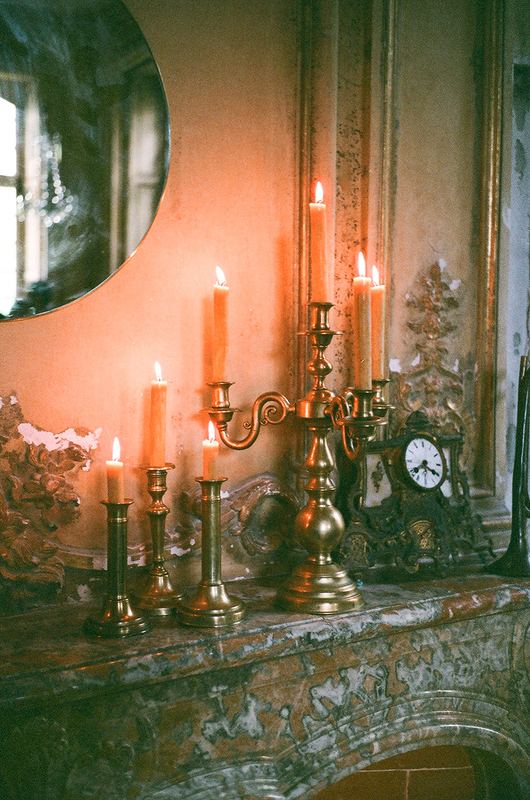 Candles on the marble mantel