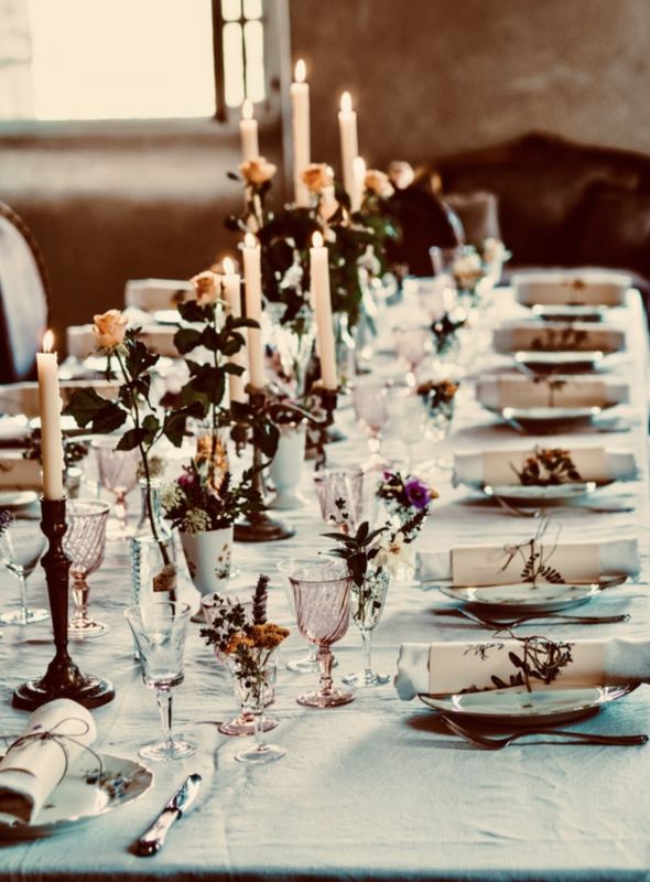 Roses and candles down the long table